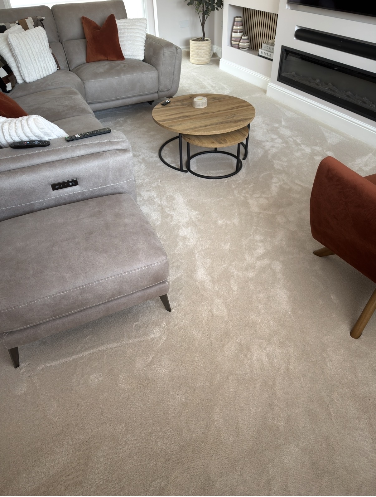 A beautifully carpeted living room completed by Affordable Floors 2 You